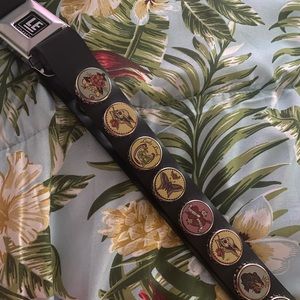 Bottle cap “seat belt” belt